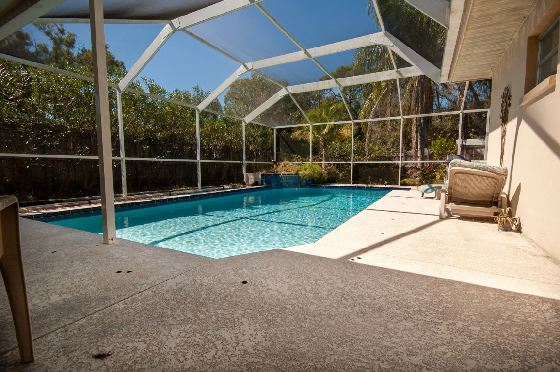 A picture of a swimming pool enclosure