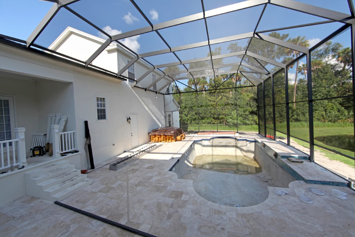 An image of a beautiful privacy pool screen cage